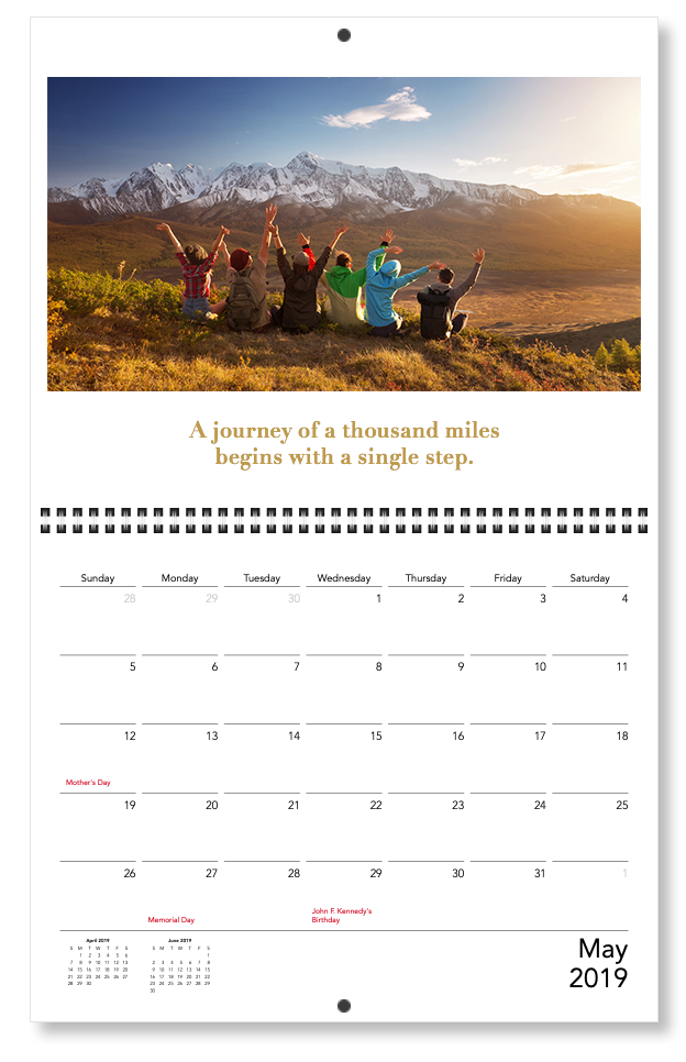 A custom calendar with a motivation quote of “A journey of a thousand miles begins with a single step.” | Motif