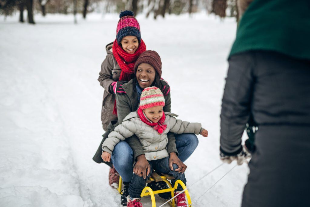 Snow day with family stock photo