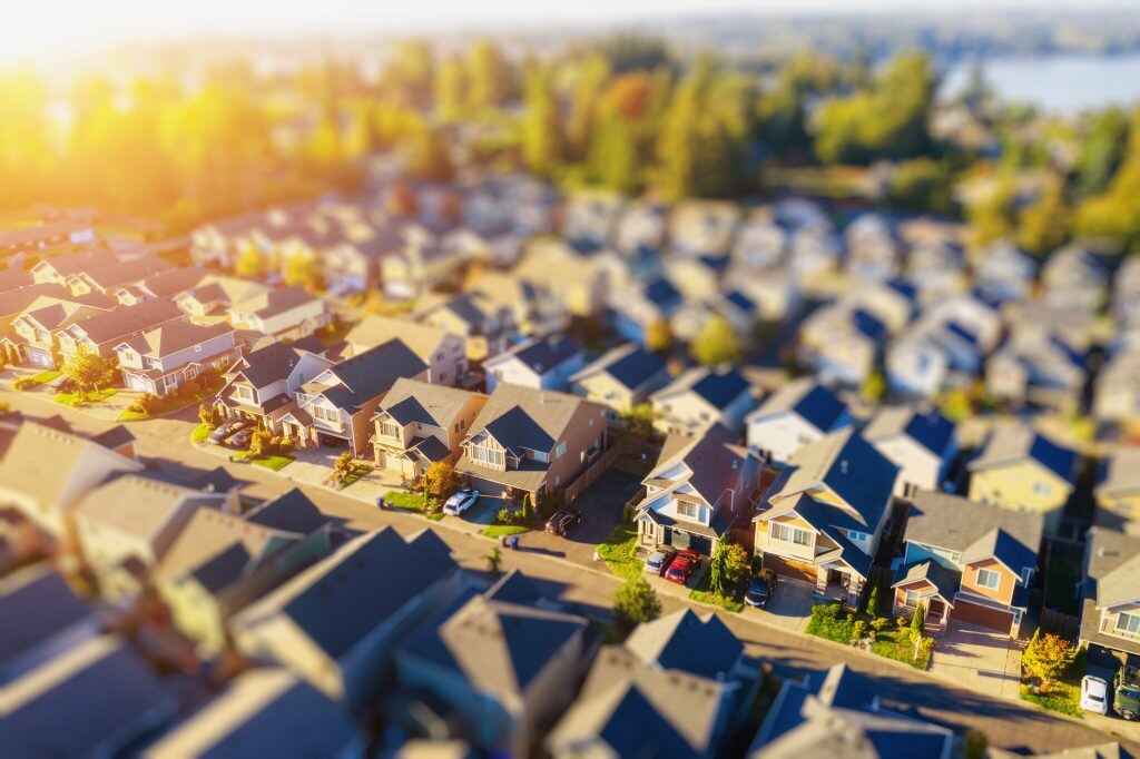 This neighborhood aerial was taken with tilt-shift lens to make homes appear miniature.