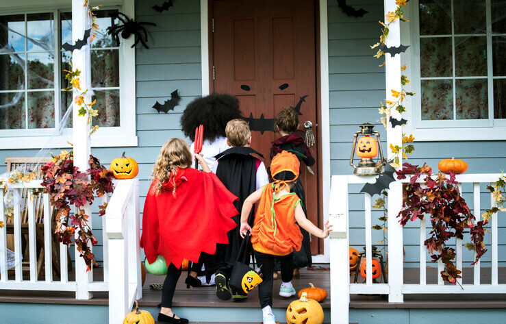 Kids trick-or-treating is one of the harder Halloween photoshoot ideas, but it’s worth it.