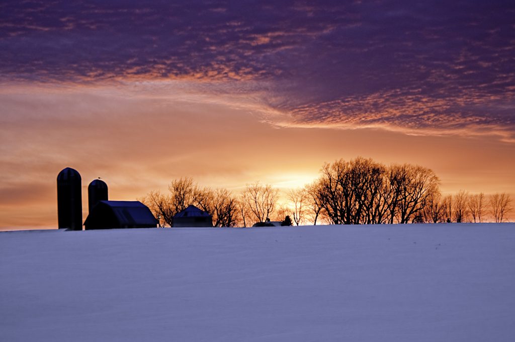 Use these snow photography tips to capture snow against a colorful sky | Motif