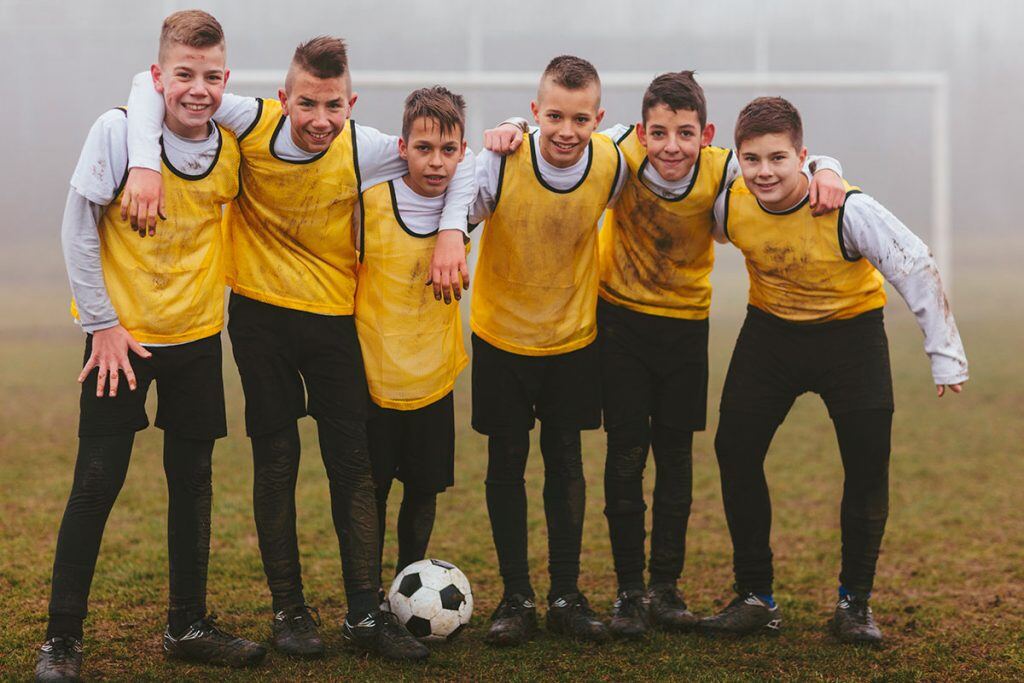 A group of kids after a soccer practice | Motif