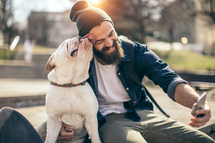 A selfie celebrating a pet can highlight a personalized photo calendar.